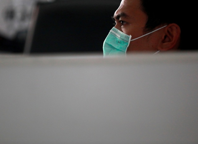 Châu Á đón Tết Âm lịch trong nỗi lo về dịch viêm phổi lạ - Ảnh minh hoạ 8