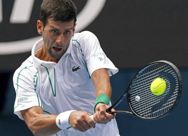 Australian Open: Djokovic, Federer giành quyền vào tứ kết Australian Open: Djokovic, Federer giành quyền vào tứ kết