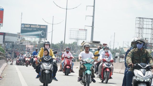 Người dân miền Tây đổ về Sài Gòn sau Tết - 5 Người dân miền Tây đổ về Sài Gòn sau Tết - 5