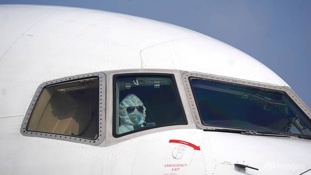 wuhanpilotwearingsuit-1580268824352.jpg