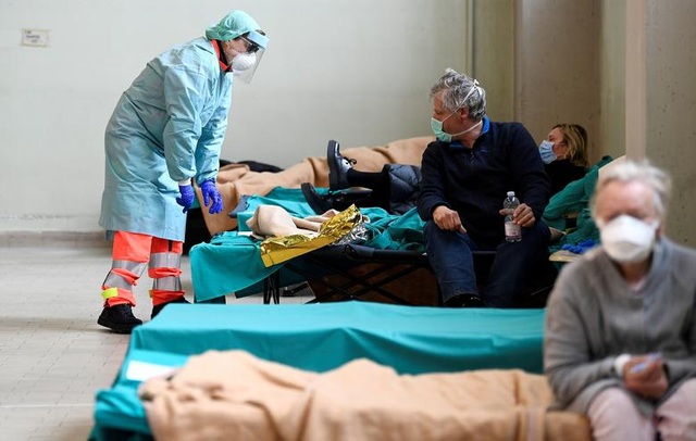 Hơn 1.400 người chết, các bệnh viện ở Italia gồng mình đối phó Covid-19 - 1
