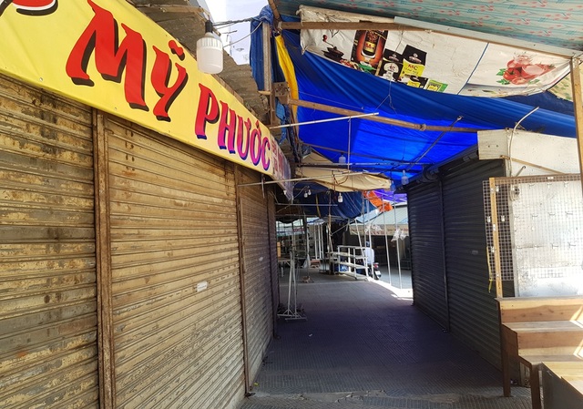Hàng chục tiểu thương chợ Đầm Nha Trang đóng cửa, nghỉ bán vì Covid-19 - 5