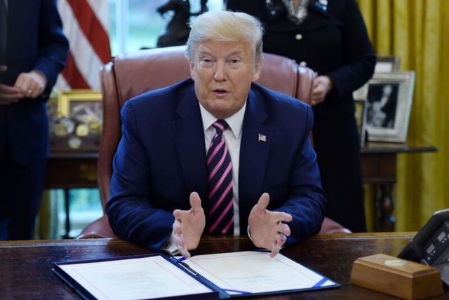Gần 52.000 người chết vì Covid-19, ông Trump nói Mỹ đã ứng phó rất tốt - 1