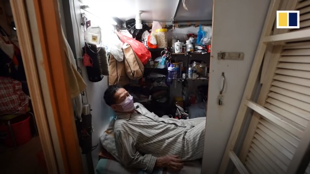 Người nghèo Hong Kong khốn khổ trong nhà “quan tài” giữa dịch Covid-19 - 1 Người nghèo Hong Kong khốn khổ trong nhà “quan tài” giữa dịch Covid-19 - 1