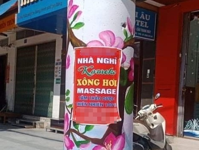 Bị phạt 40 triệu đồng vì tờ quảng cáo massage trên cột điện - 1