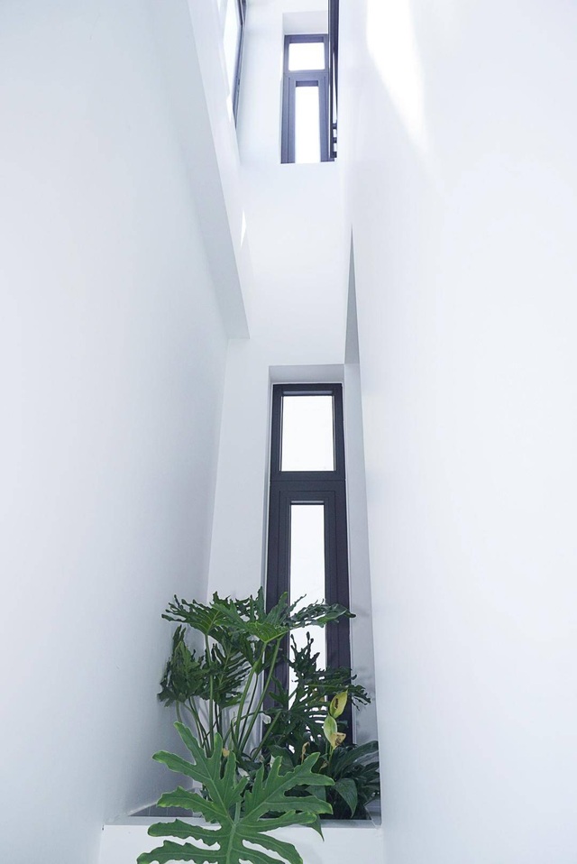 Nhà 39 m2 trong hẻm ở Sài Gòn như rộng ra gấp đôi nhờ độc chiêu thiết kế - 4 Nhà 39 m2 trong hẻm ở Sài Gòn như rộng ra gấp đôi nhờ độc chiêu thiết kế - 4