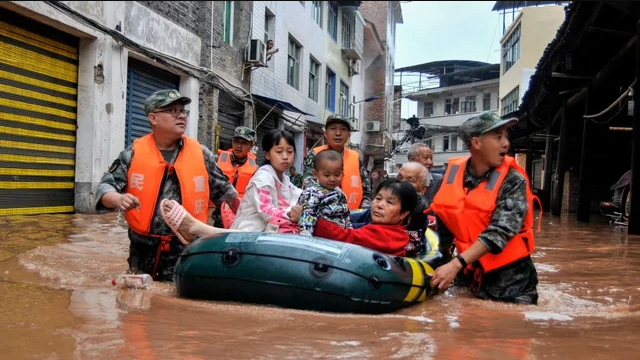 Người nghèo Trung Quốc gánh khó khăn chồng chất do thiên tai - 1 Người nghèo Trung Quốc gánh khó khăn chồng chất do thiên tai - 1