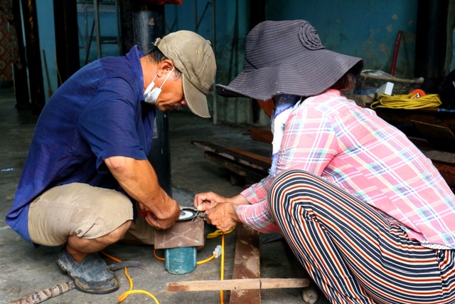 Phố cổ Hội An bảo vệ di tích trước khi bão đổ bộ - 8 Phố cổ Hội An bảo vệ di tích trước khi bão đổ bộ - 8