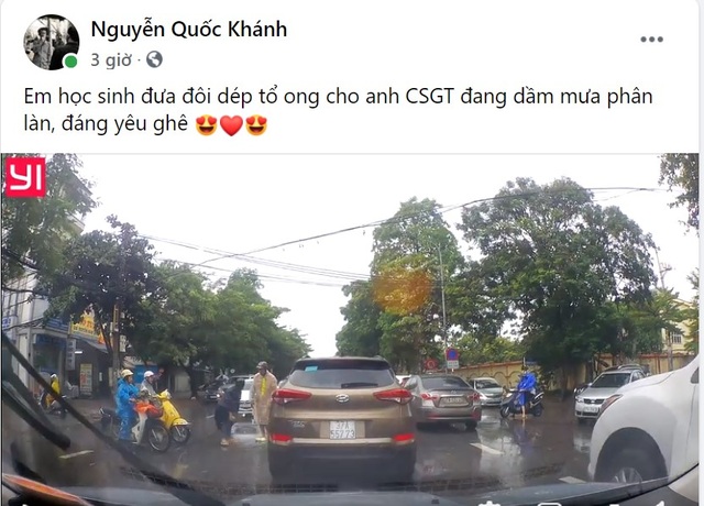 CSGT bất ngờ được tặng dép khi chân không đứng phân làn đường giữa trời mưa - 2 CSGT bất ngờ được tặng dép khi chân không đứng phân làn đường giữa trời mưa - 2