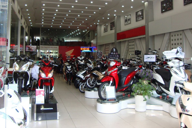 Thị trường ế ẩm, các hãng xe máy chạy đua khuyến mại để kéo khách - 1 Thị trường ế ẩm, các hãng xe máy chạy đua khuyến mại để kéo khách - 1