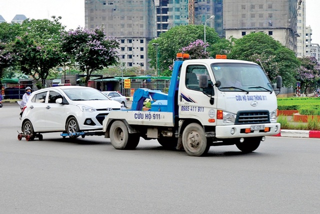 Chủ phương tiện vi phạm có được mặc cả phí cẩu, kéo xe không? - 3 Chủ phương tiện vi phạm có được mặc cả phí cẩu, kéo xe không? - 3