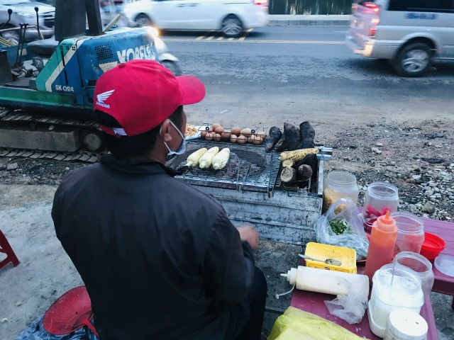 Unique profession of selling a warm belly to tourists in the middle of the flower street - 3