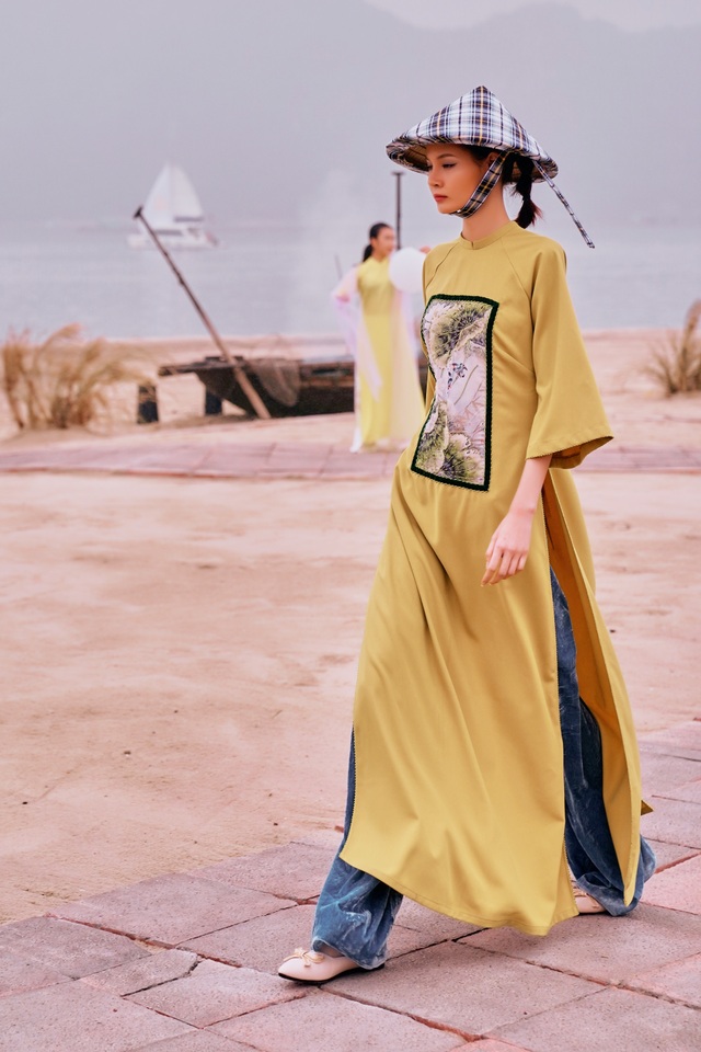 Hoa hậu Thùy Dung trình diễn áo dài bên bờ biển vịnh Bái Tử Long - 6