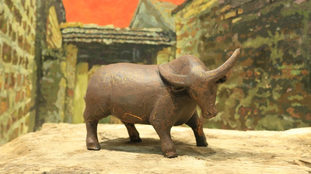 Gold-plated wooden buffaloes 1010 in an old village near Hanoi - 3