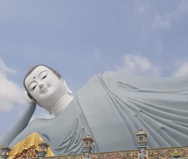 Close-up of the century-old pagoda with the unique giant reclining Buddha statue in Vietnam - 6