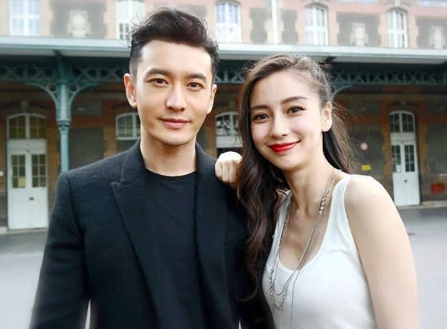 Huỳnh Hiểu Minh lộ ảnh đi bar với gái trẻ, Angelababy hôn má trai lạ - 2 Huỳnh Hiểu Minh lộ ảnh đi bar với gái trẻ, Angelababy hôn má trai lạ - 2