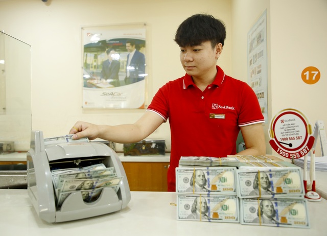Giá USD tự do tạo sóng lớn rồi bất ngờ lao dốc - 1 Giá USD tự do tạo sóng lớn rồi bất ngờ lao dốc - 1