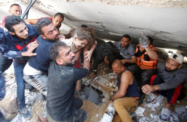Cảnh sống khốn khổ trong mưa bom bão đạn ở chảo lửa Gaza - 2