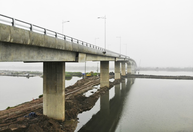 Cận cảnh cây cầu nghìn tỷ vượt sông Ninh Cơ chuẩn bị thông xe - 5