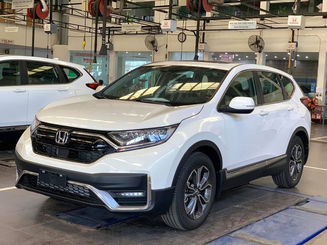 Honda CR-V, Pajero Sport giảm giá cả trăm triệu đồng để xả hàng tồn - 1