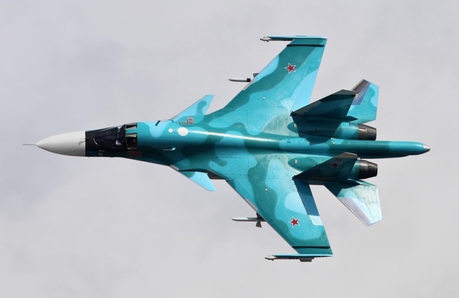 Xe tăng bay Su-34 Nga nhào lộn, dội tên lửa san phẳng mục tiêu - 1