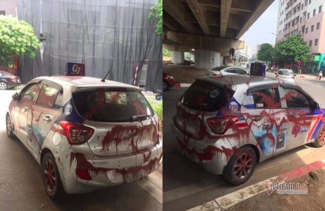 Xe taxi bị tạt kín sơn ở Linh Đàm, tài xế phẫn nộ - 1