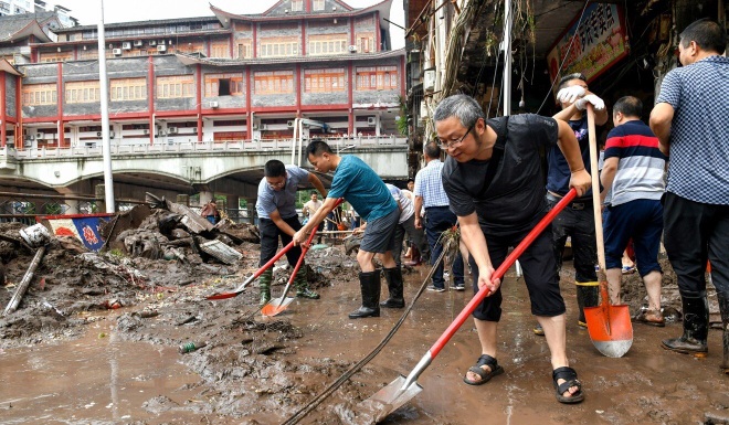 Lũ lụt cuốn phăng nhà cửa, cầu cống, Trung Quốc thiệt hại 27 triệu USD - 3