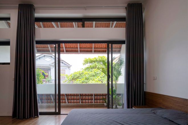 Nhà mái trượt tạo không gian sống xanh, giữ ký ức của gia chủ Nghệ An - 9 Nhà mái trượt tạo không gian sống xanh, giữ ký ức của gia chủ Nghệ An - 9