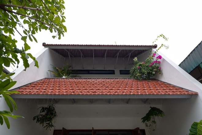 Nhà mái trượt tạo không gian sống xanh, giữ ký ức của gia chủ Nghệ An - 10 Nhà mái trượt tạo không gian sống xanh, giữ ký ức của gia chủ Nghệ An - 10