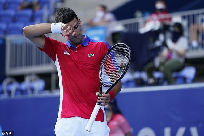 Djokovic đau đớn khi tan mộng giành HCV Olympic - 1
