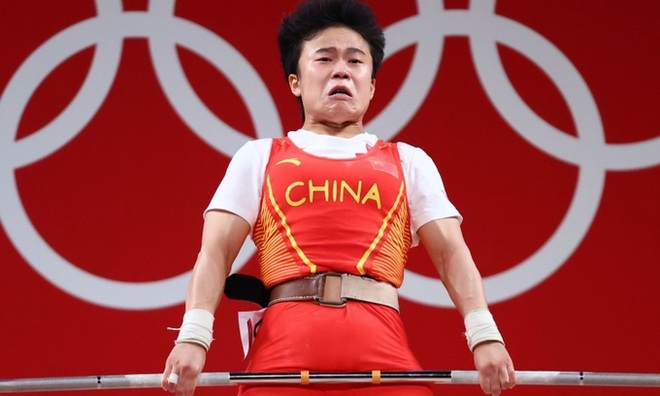 Trung Quốc nổi giận vì nhà vô địch Olympic bị chụp ảnh dìm hàng - 1