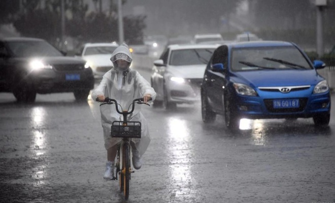Trung Quốc: Sập đường do mưa lớn, 5 người thiệt mạng - 1