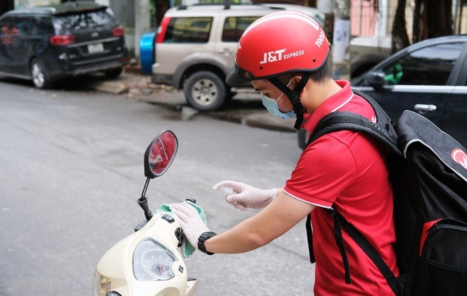 Hà Nội: Số ca mắc mới vẫn tăng, tìm người đến mua xăng ở quận Hoàng Mai - 1