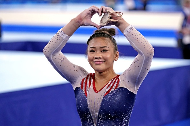Vẻ duyên dáng của cô gái người HMông giành HCV Olympic - 1 Vẻ duyên dáng của cô gái người HMông giành HCV Olympic - 1
