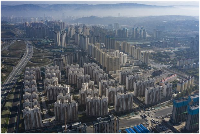 Hậu Evergrande, bất động sản Trung Quốc đối mặt với núi nợ 5.200 tỷ USD - 1