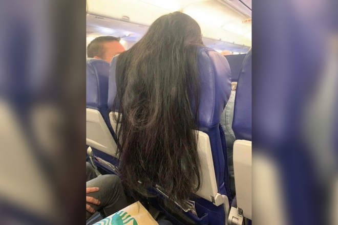 Tranh cãi quanh mái tóc của người phụ nữ trên máy bay - 1
