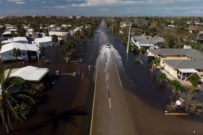 Người Florida chật vật đối mặt với hậu quả sau bão Ian - 7