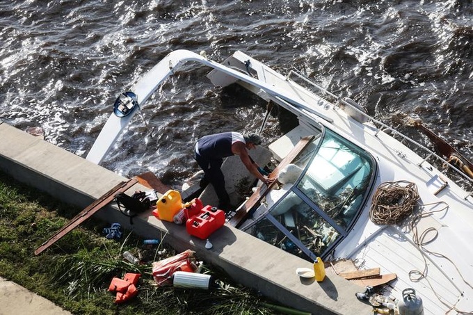Người Florida chật vật đối mặt với hậu quả sau bão Ian - 13
