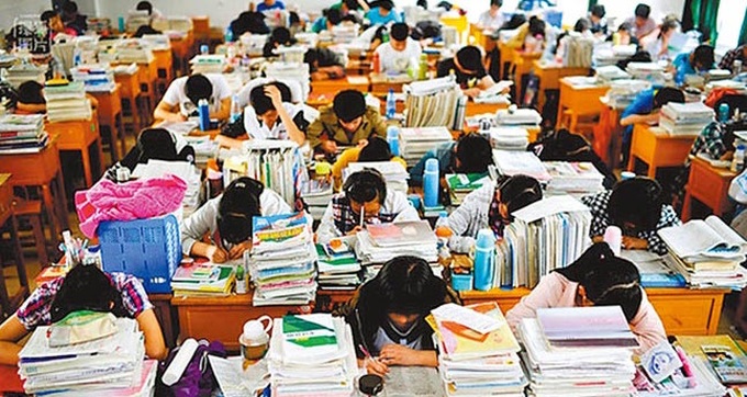 Trung Quốc cấm thi viết, cắt bài tập về nhà với học sinh nhỏ tuổi - 1