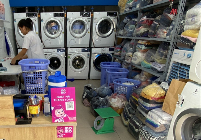 Mã QR MoMo giúp tiểu thương bắt nhịp xu hướng thanh toán không tiền mặt - 2 Mã QR MoMo giúp tiểu thương bắt nhịp xu hướng thanh toán không tiền mặt - 2