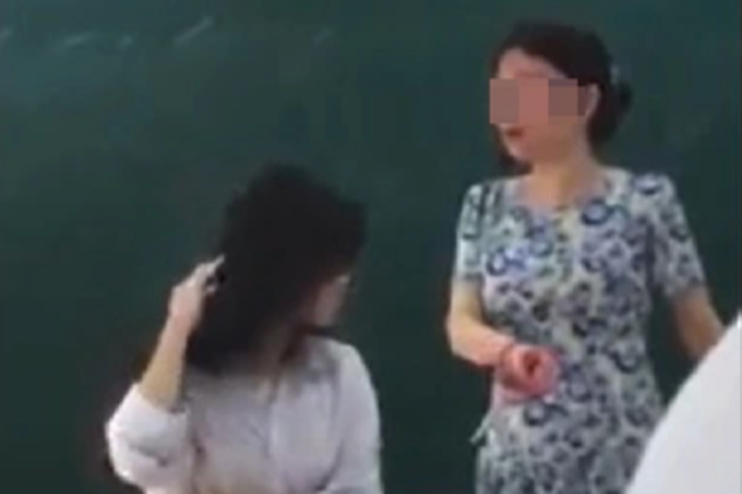 Vụ cô giáo cắt tóc nữ sinh: Cần trách phạt chứ không phải trừng phạt - 2