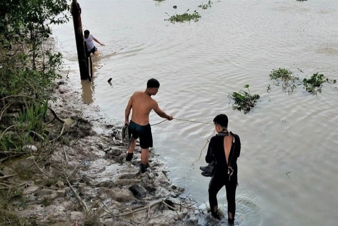 Hai bé trai thiệt mạng trong lúc tắm sông ở TPHCM - 1