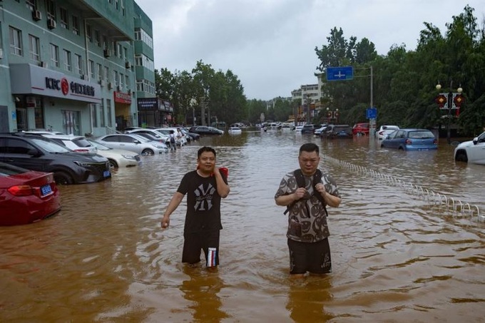 Bắc Kinh hứng đợt mưa lớn nhất 140 năm - 1