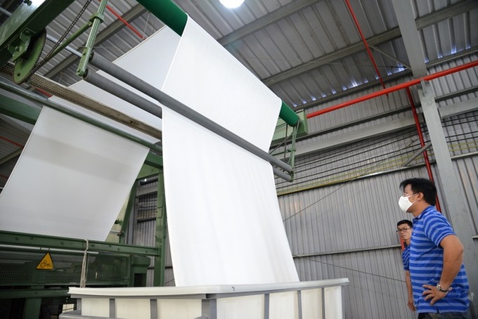 HCM City speeds up cloth face mask production process - 2