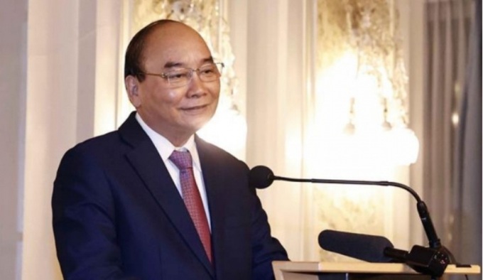President Phuc meets overseas Vietnamese community representatives - 1
