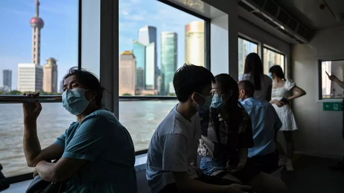 Shanghai to lock down and test 2.7 million as Covid fears linger - 1