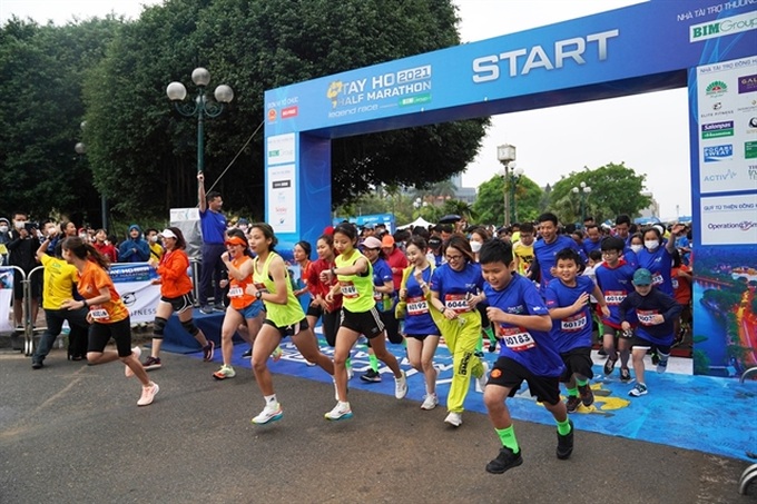 Record number of runners to take part in Tây Hồ Half Marathon 2023 - 1