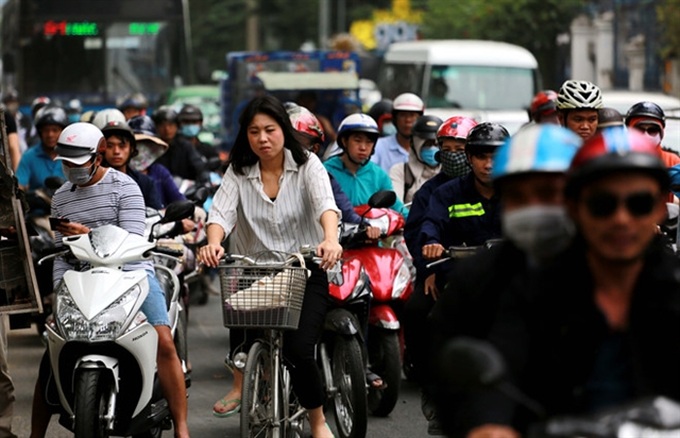 HCM City mulls public bicycle rental service in downtown - 1