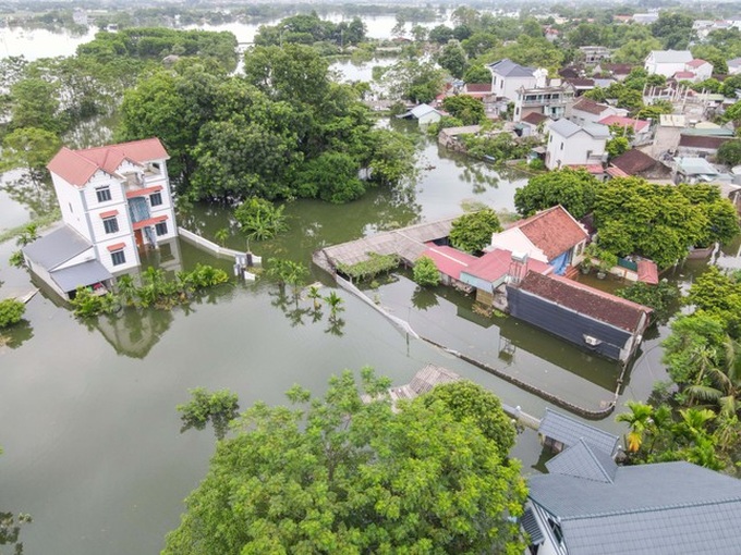 More than 7,400 people in flooded Hanoi areas need help - 1 More than 7,400 people in flooded Hanoi areas need help - 1