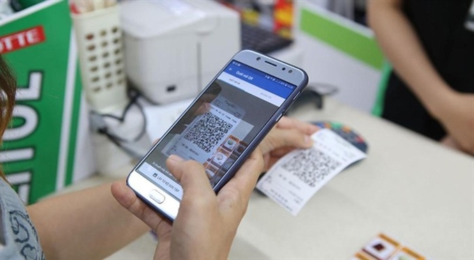 Central bank delays foreign ownership cap in payment services industry - 1